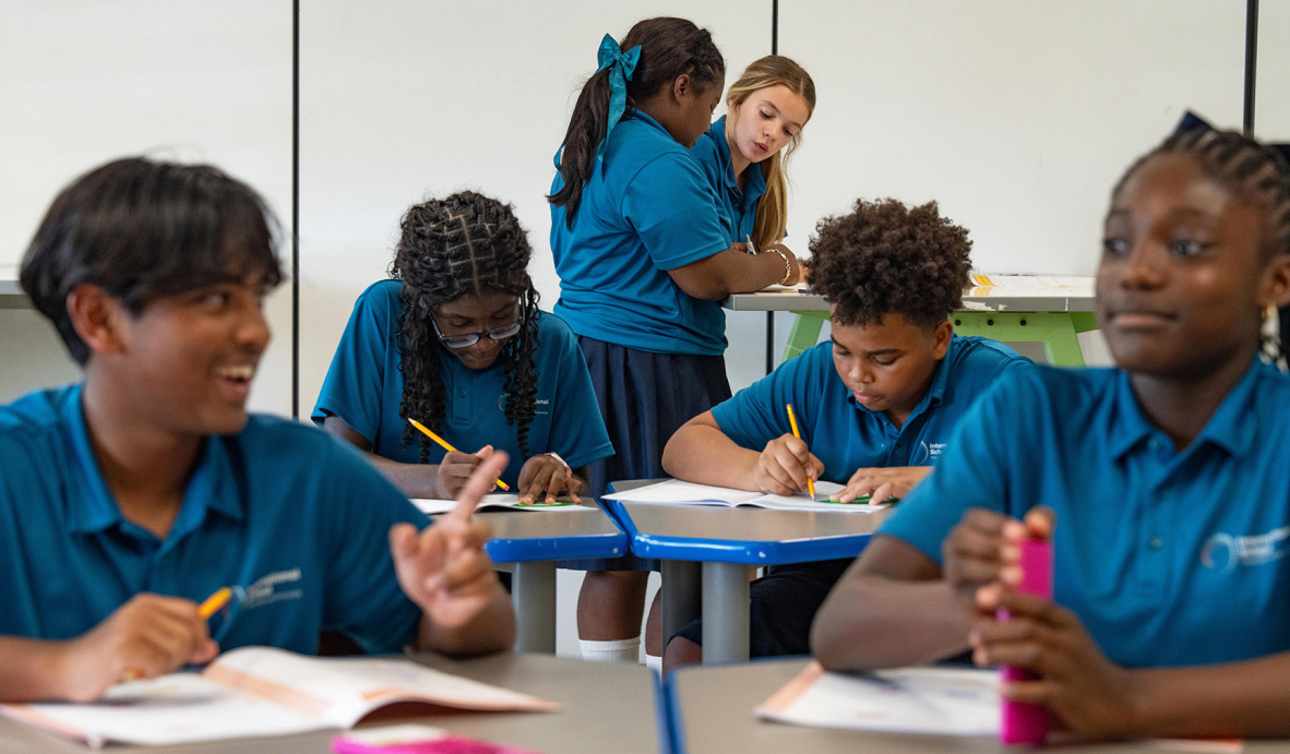 Students learning together in a nurturing classroom at the International School Turks and Caicos Islands, fostering belonging and academic growth.