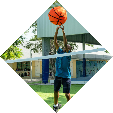 Student playing basketball during co-curricular sports activities at International School Turks and Caicos Islands